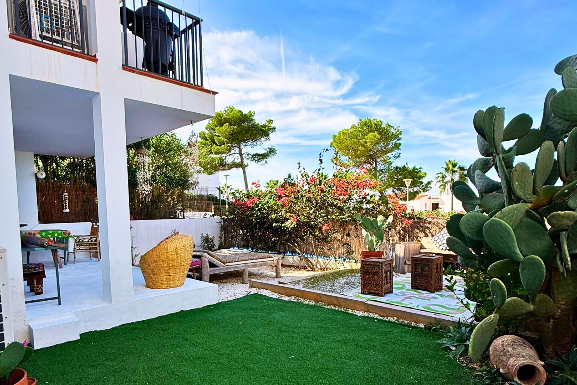 Resa Estates Ibiza Cala Tarida first line 3 bedrooms garden grass.jpg